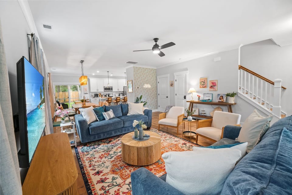 Cozy Living Room with an Open Floor Plan, Lots of Seating & a Smart TV and Games