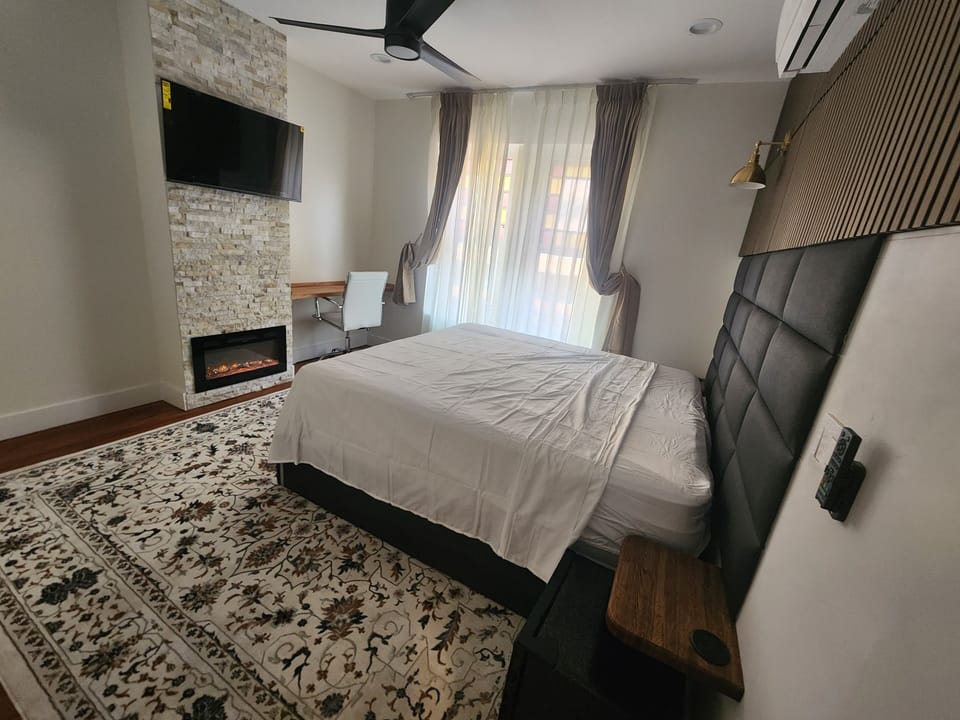 Clean and cozy bedroom designed for comfort, peaceful nights, and a restful stay after a long day at Dupont circle near Washington DC