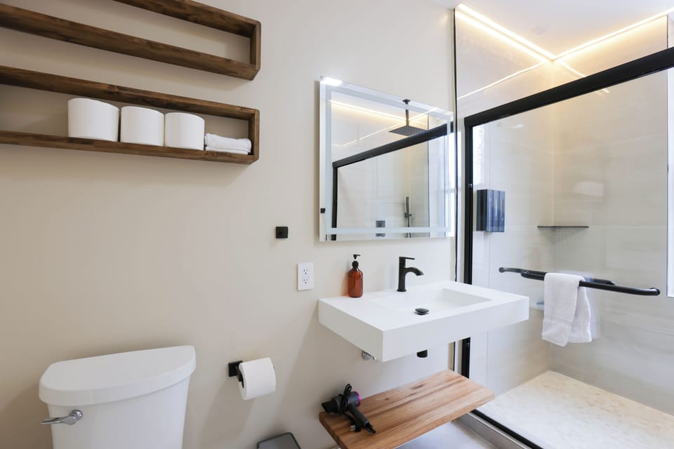 Clean and modern bathroom with essential amenities for a fresh, comfortable, and relaxing experience at Dupont circle near Washington DC
