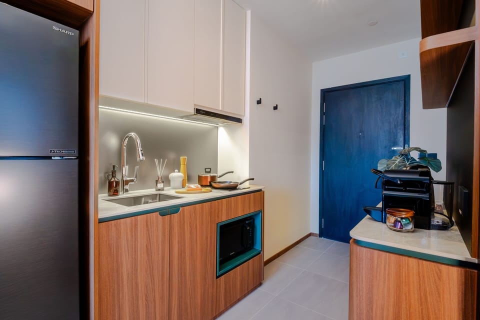 Family Suite, 2 Bathrooms | Private kitchen | Coffee/tea maker, full-size fridge, microwave, dishwasher