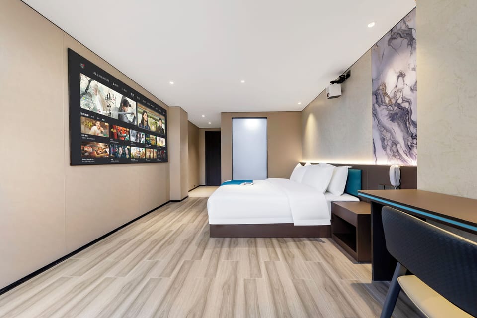 Luxury Double Room, City View | Desk, laptop workspace, blackout drapes, soundproofing