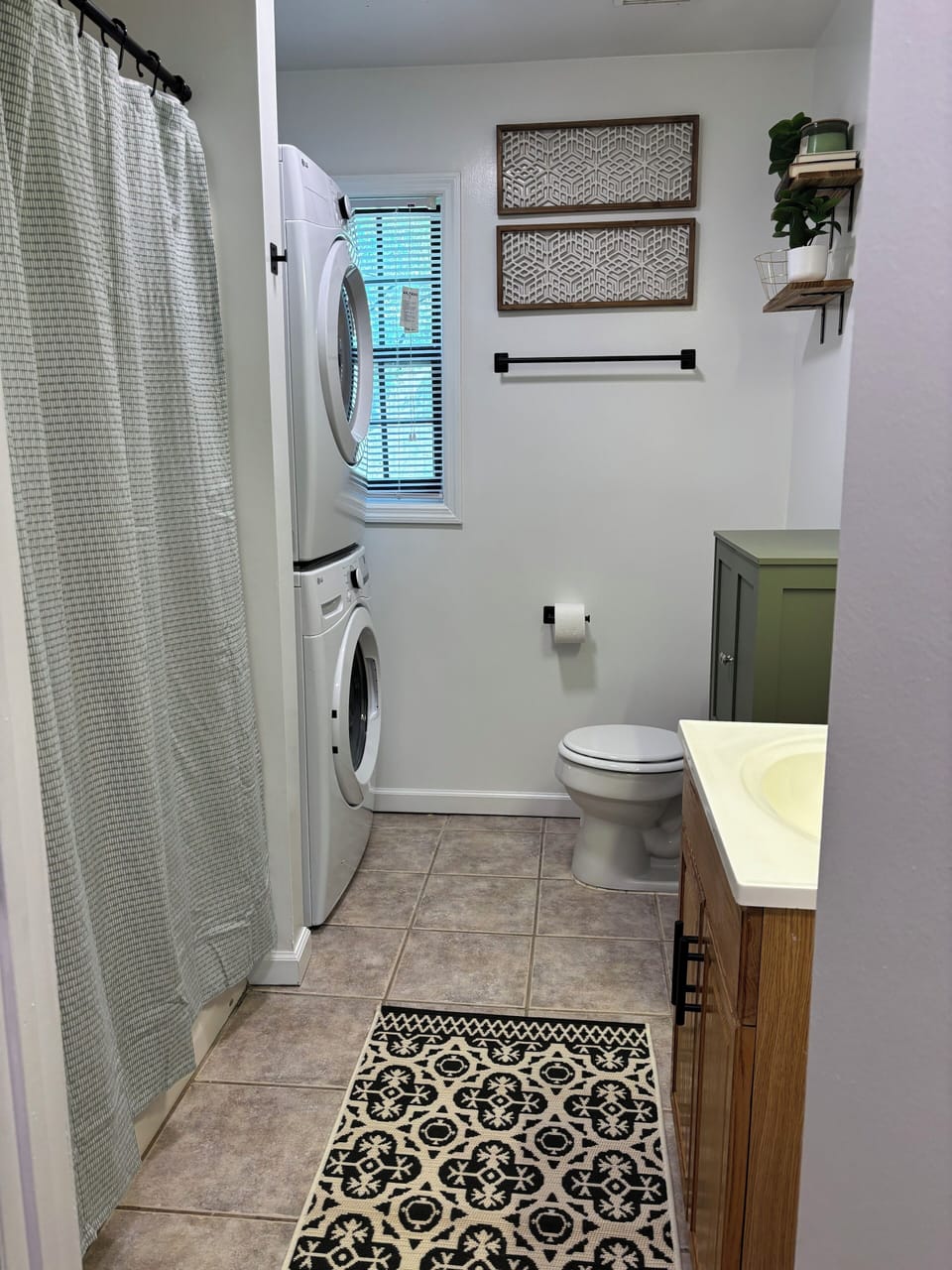 Full bathroom with washer/dryer