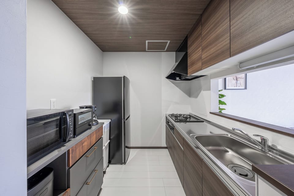 Apartment | Private kitchen | Fridge, microwave, stovetop, rice cooker