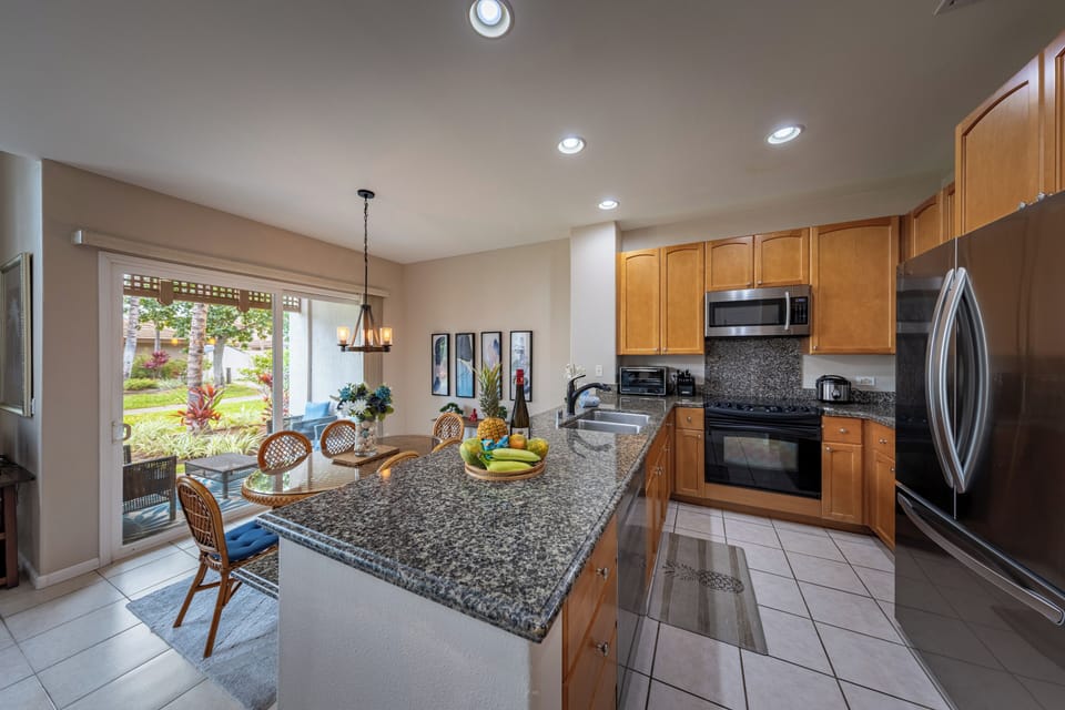 Fully equipped kitchen connected to the living and dining area.