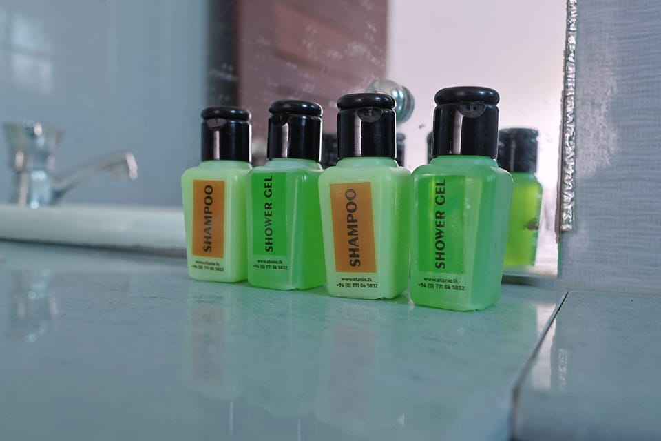 Shower, towels, soap, shampoo