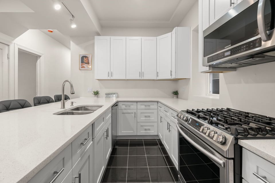 Enjoy meals and conversation in this open kitchen with breakfast bar.