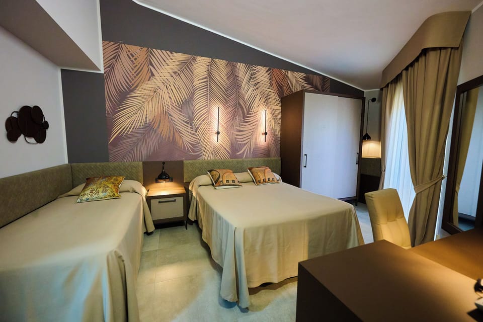 Deluxe Triple Room | In-room safe, desk, iron/ironing board, free WiFi