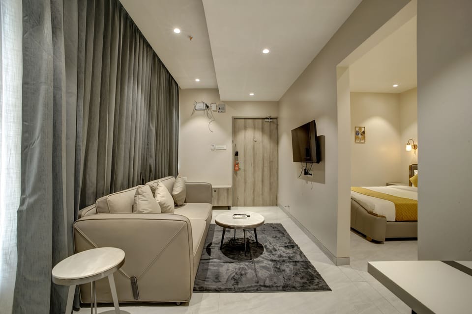 Signature Studio Suite, 1 Bedroom, Balcony, City View | Premium bedding, minibar, individually furnished, desk