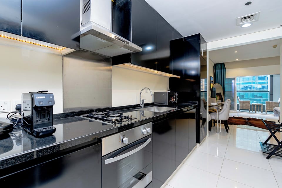 Classic Studio, Balcony, City View | Private kitchen | Coffee/tea maker