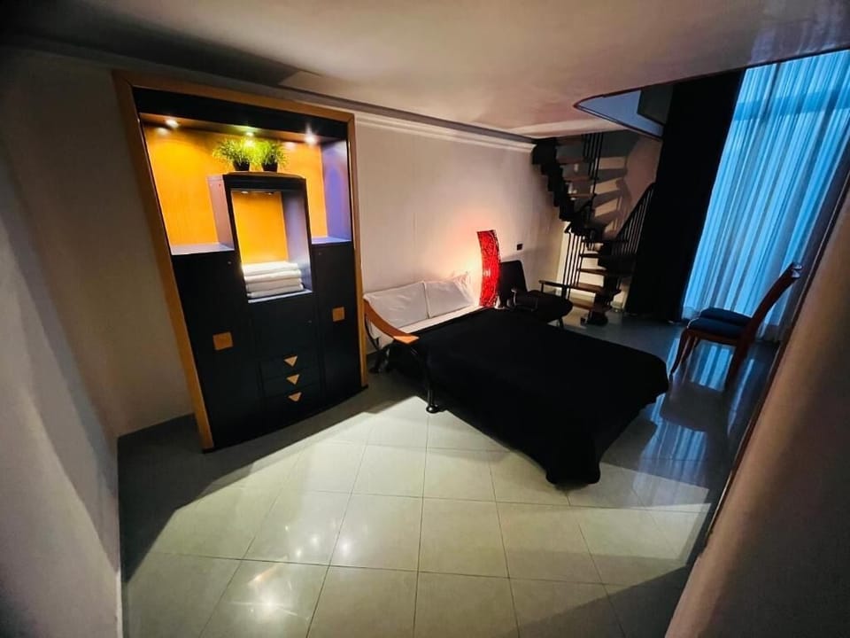 Family Room, Balcony, City View | Free WiFi