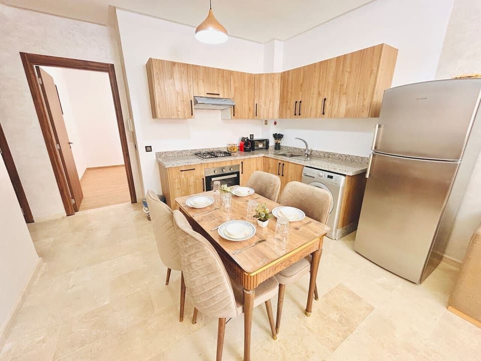 Spacious kitchen connected to the living room and dining area, perfect for entertaining.