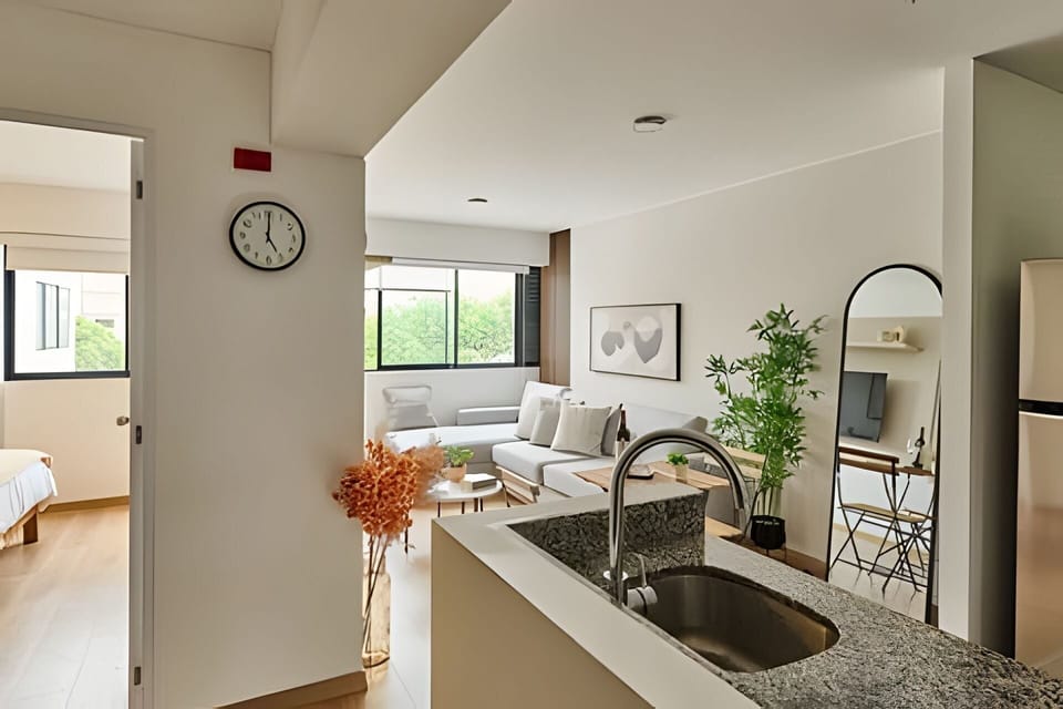 Basic Apartment | Living area | Flat-screen TV, computer monitors