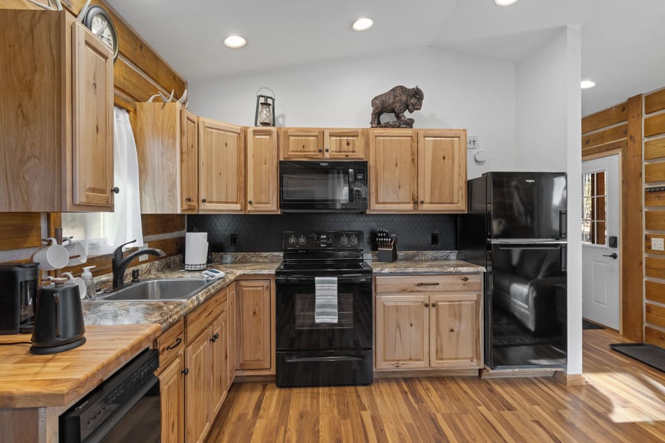 Cook something amazing in our fully equipped and stocked log cabin kitchen—rustic, inviting, and made for memorable meals.