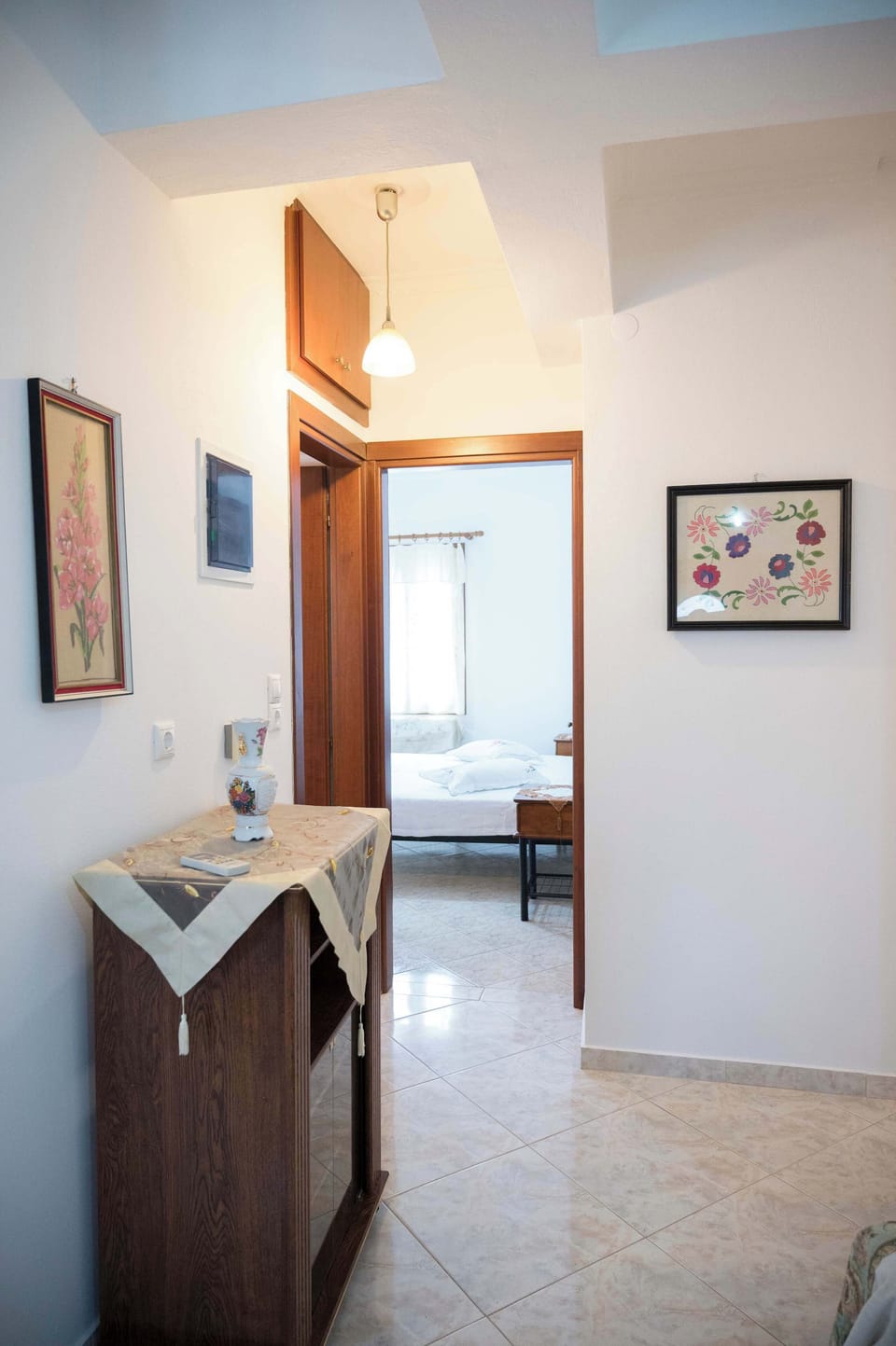 Hallway leading to the bedroom and bathroom.