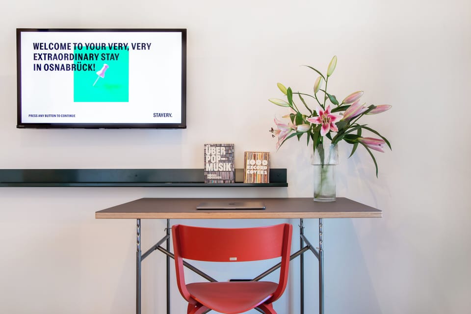 Design Apartment | Living area | Flat-screen TV