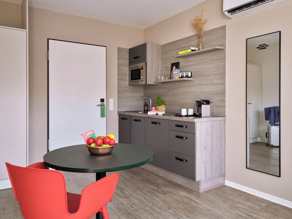 Deluxe Studio, Air conditioning | Private kitchen | Fridge, microwave, stovetop, dishwasher