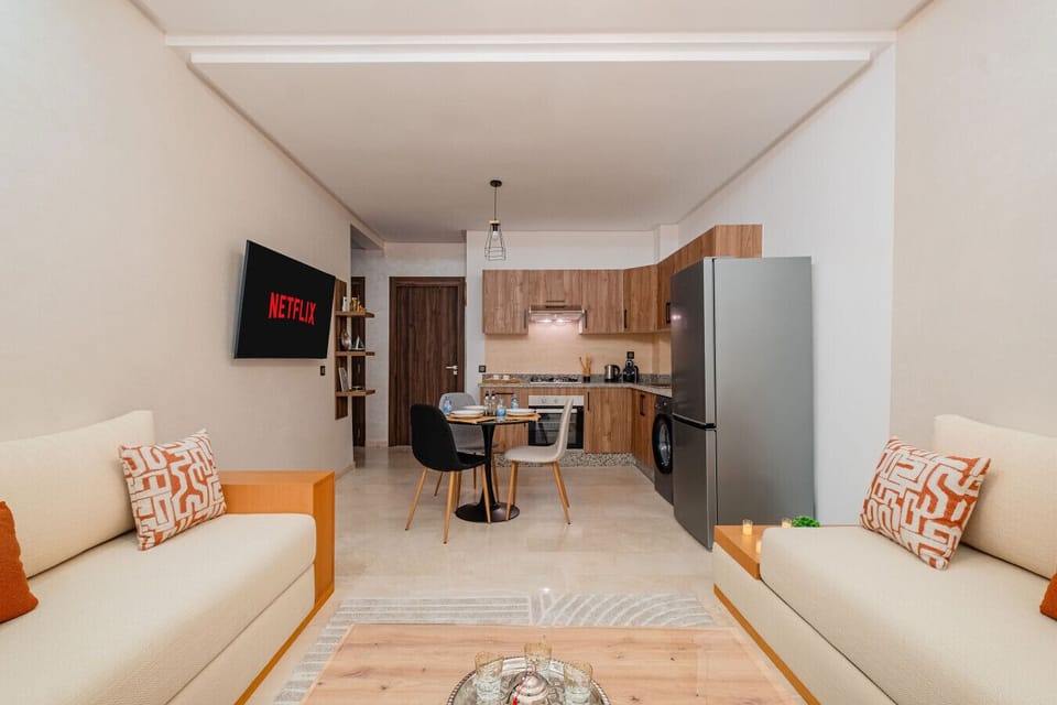Spacious kitchen connected to the living room and dining area, perfect for entertaining.