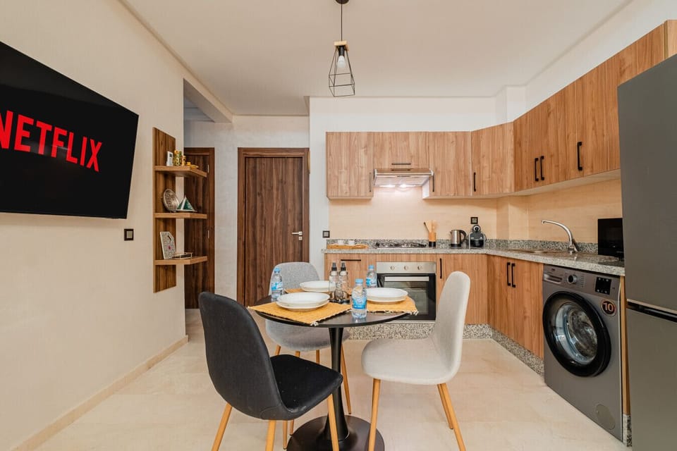 Spacious kitchen connected to the living room and dining area, perfect for entertaining.