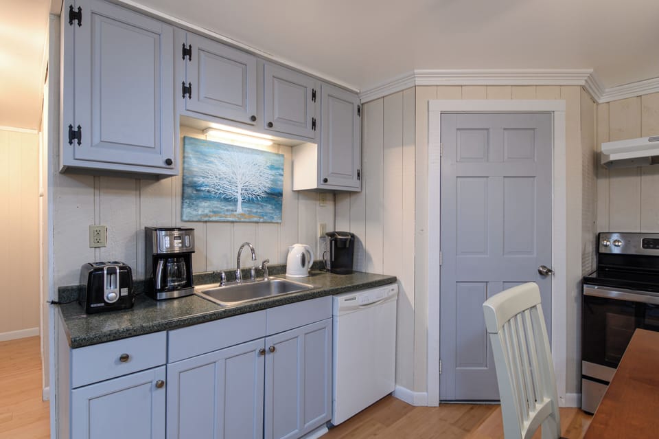Cook, chat, and create memories in the cozy kitchen with all the tools and appliances you need.