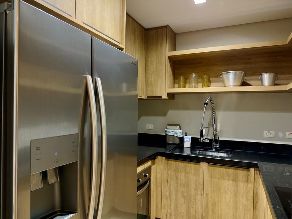 Premium Apartment, Sea View | Private kitchen | Fridge, microwave, espresso maker