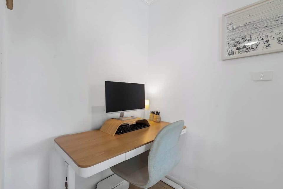 Catch up on emails or plan the day at the dedicated workspace, offering a quiet nook away from the main living area.