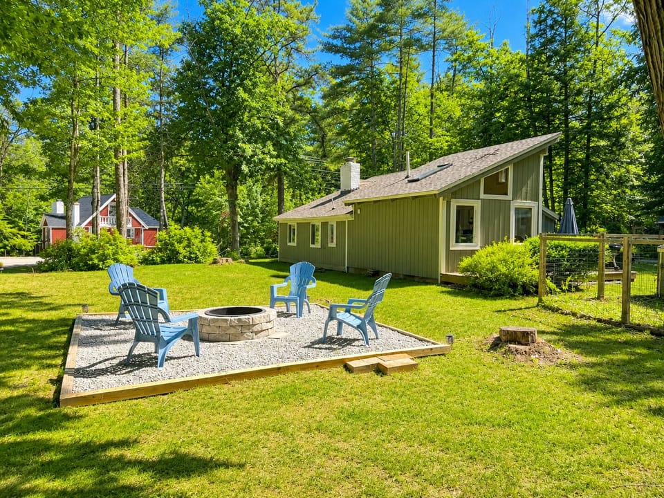 Enjoy a private Bartlett yard with a fire pit near Attitash Mountain Resort.