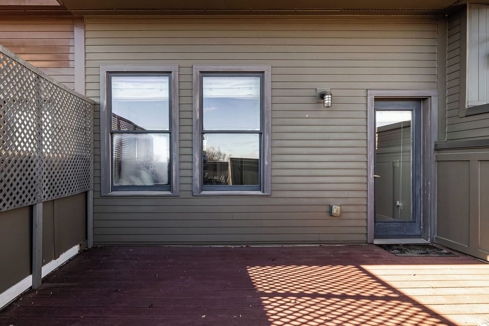 Door from Primary Suite to Outdoor Patio Balcony