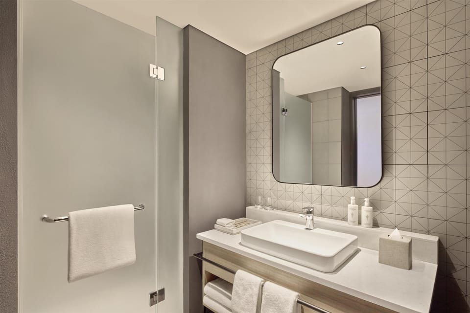 Suite, 1 King Bed (Extended Stay) | Bathroom shower