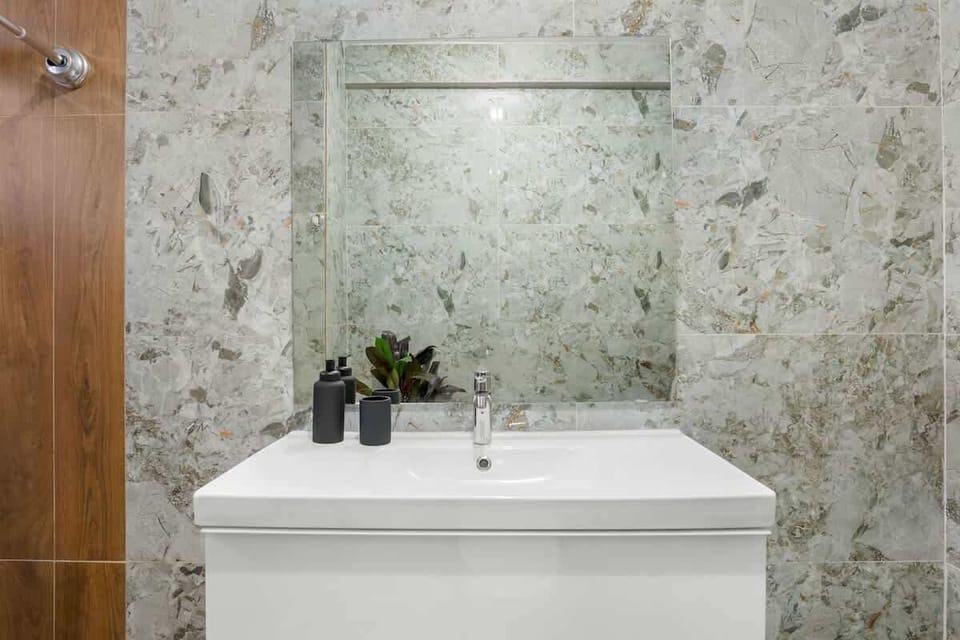 Bright vanity space with room to refresh before heading out.