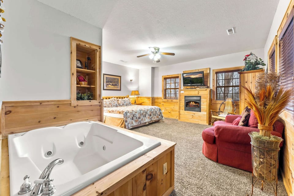 Relax in the lower-level King suite featuring a gas fireplace and a private jacuzzi tub.