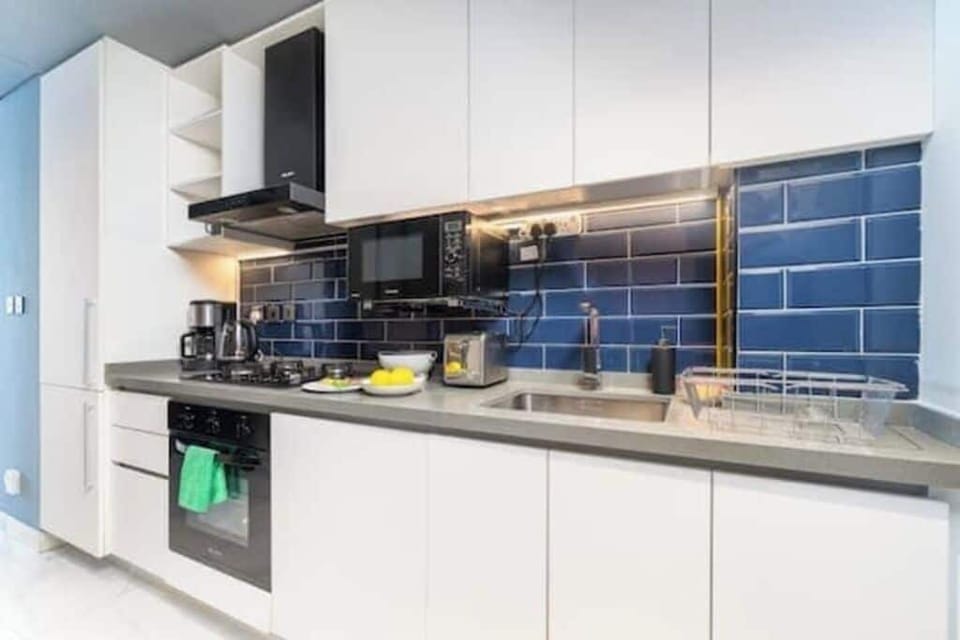 Luxury Studio, Balcony, City View | Private kitchen | Full-size fridge, microwave, oven, stovetop