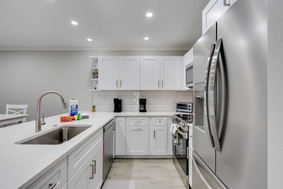 Expansive living room and renovated kitchen