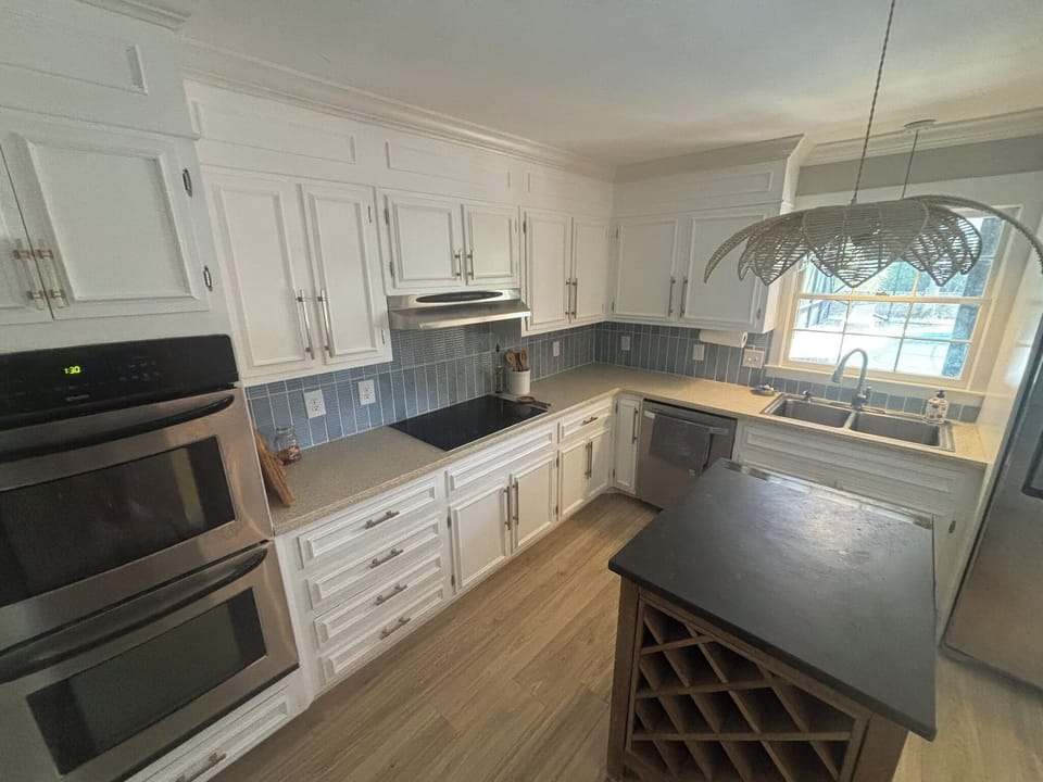 Well equipped kitchen with double ovens.