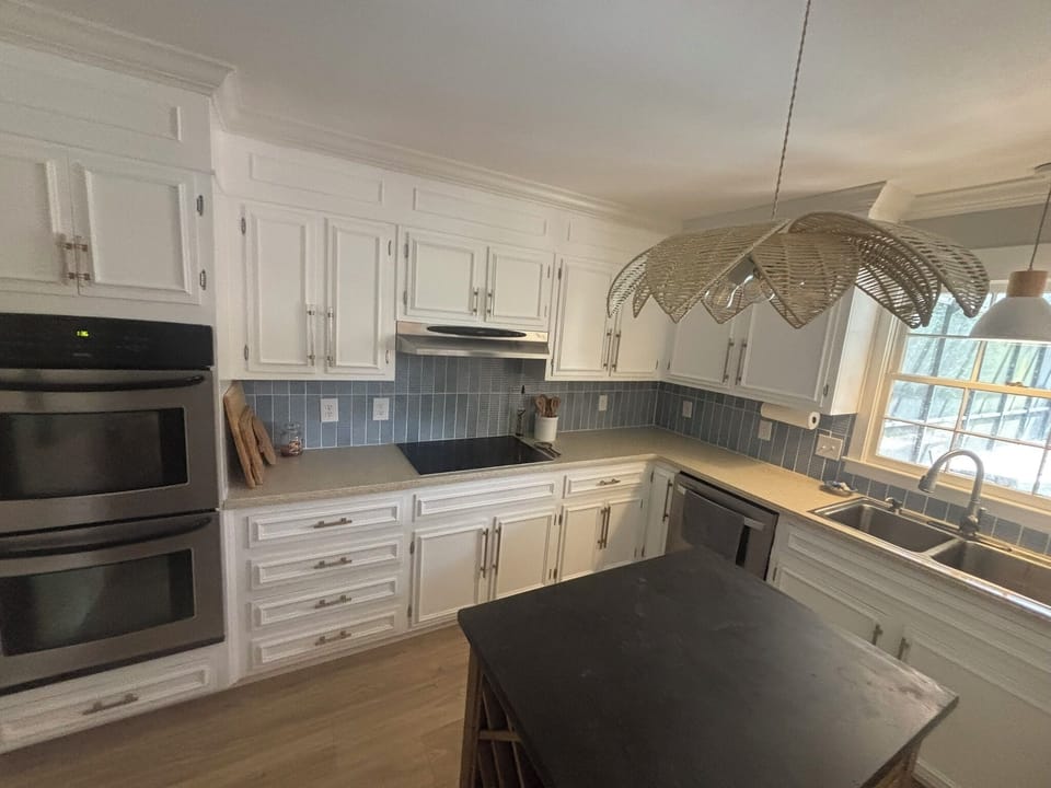 Well equipped kitchen with stainless appliances.
