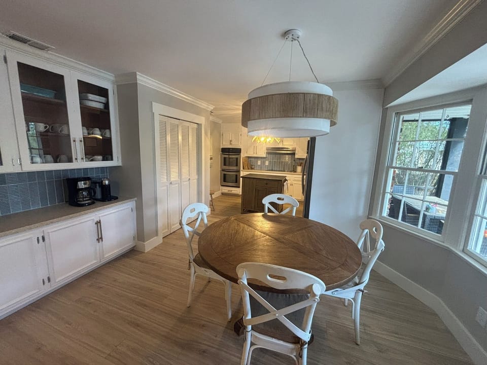 Eat in kitchen. Enjoy breakfast with a beautiful view of the pool.