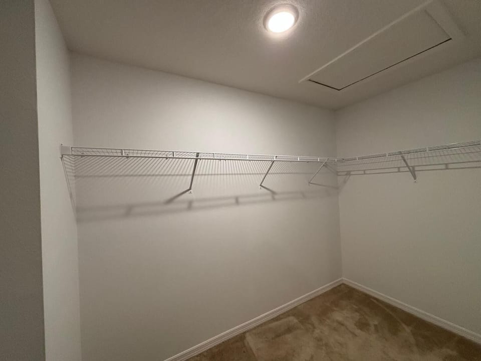 Spacious closet in master bedroom