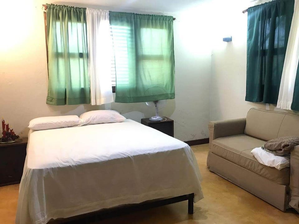 Family Cottage, Courtyard View | Blackout drapes, iron/ironing board