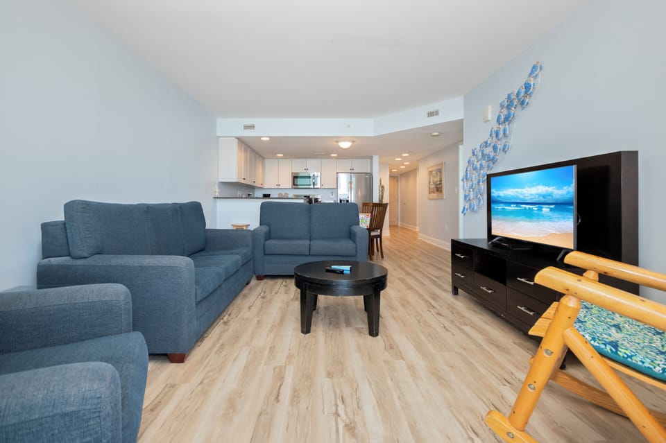 Cozy living room with comfortable seating and a warm, inviting feel.