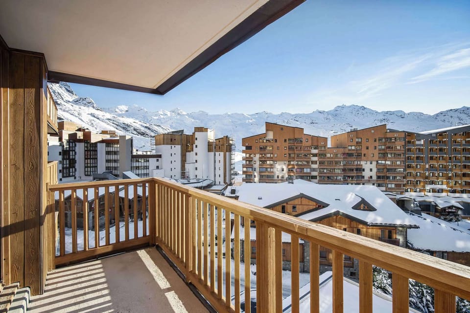Uninterrupted mountain vistas and ski village views — perfect spot to unwind after skiing.