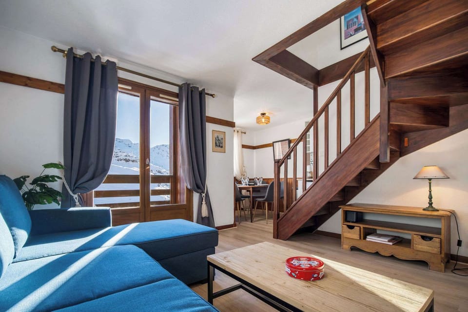 Unobstructed ski-in/ski-out view of the Val Thorens ski area, perfect for morning coffee in the Alps.
