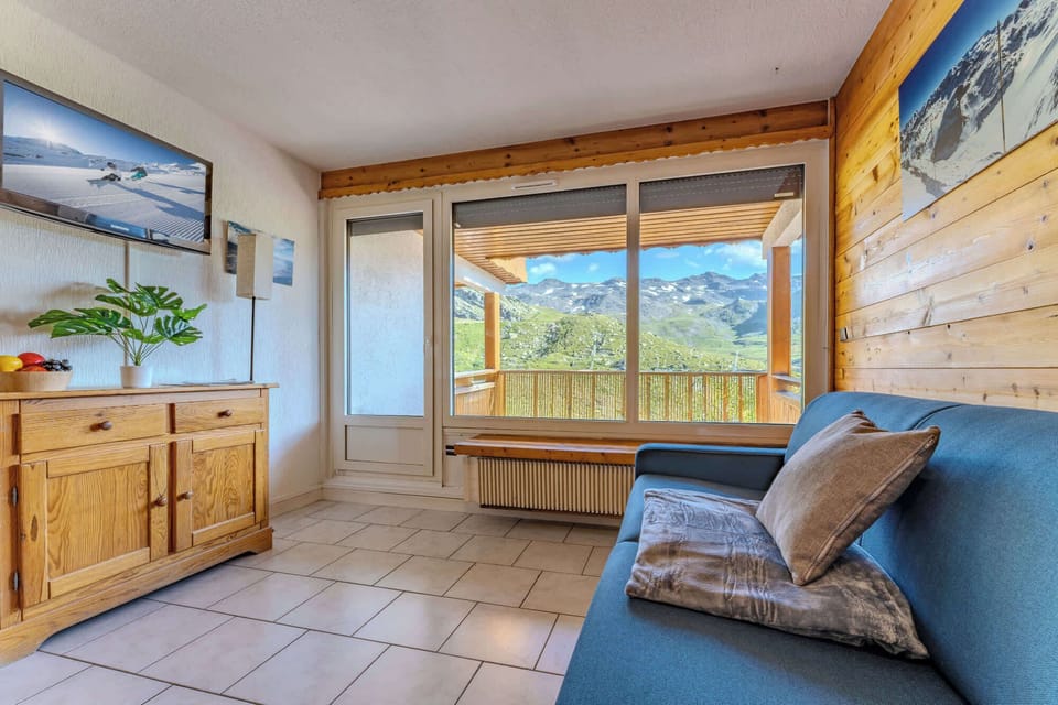 Sink into the sofa, watch your favorite shows, or simply gaze at the panoramic views from the balcony.