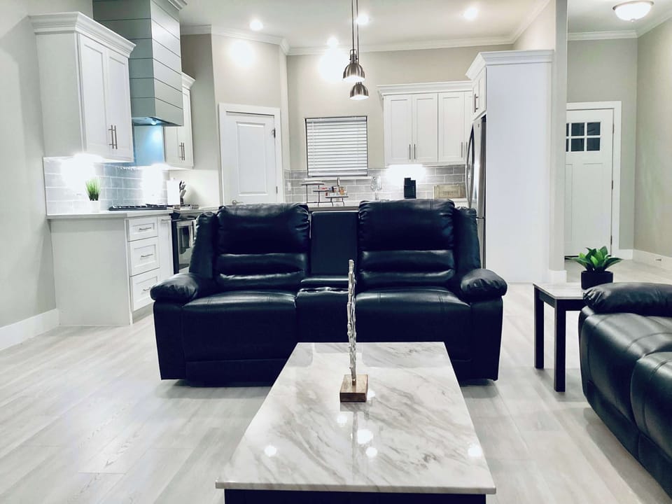 Bright open living room featuring a smart TV