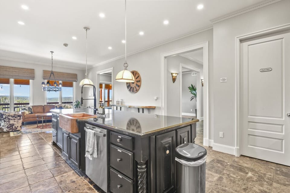 Large kitchen with cookware, essentials, and room to gather