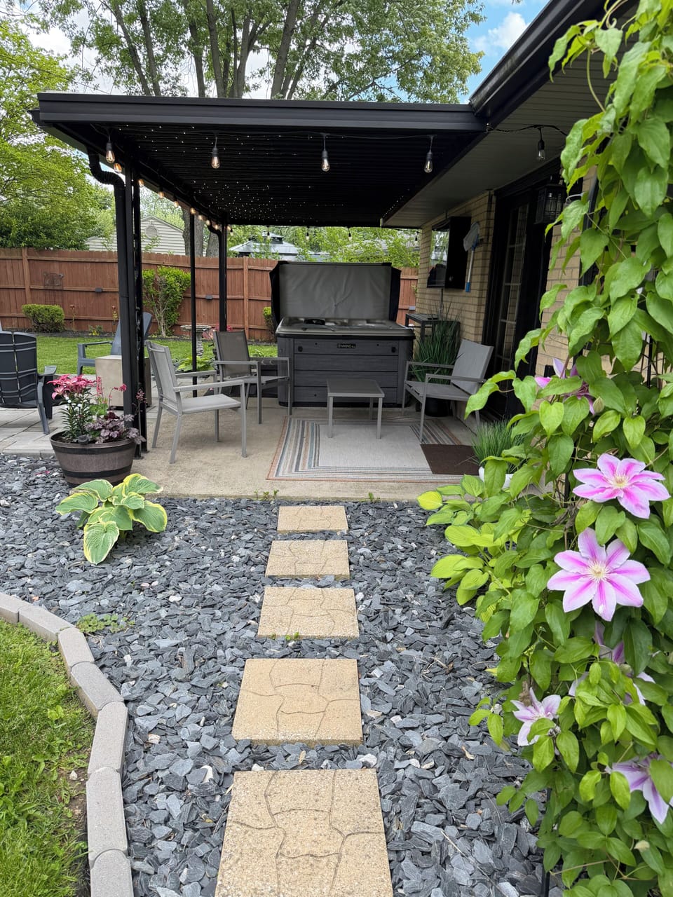 Steamy soak & outdoor TV: Your private spa retreat, rain or shine!