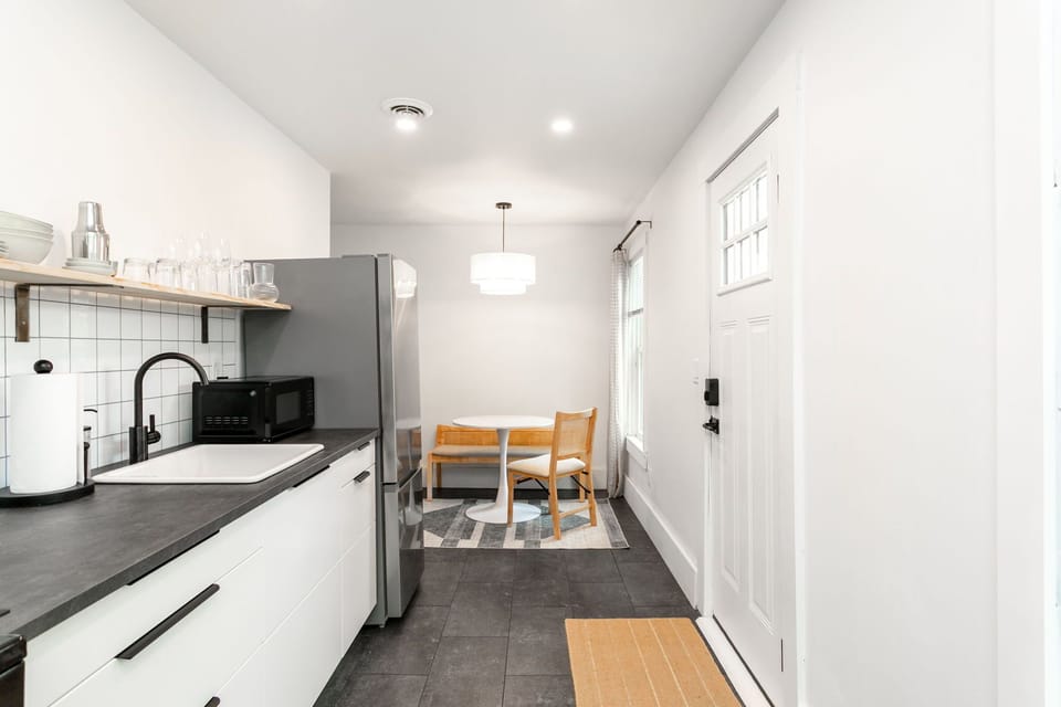 Cozy dining nook just off the kitchen, perfect for a casual meal.