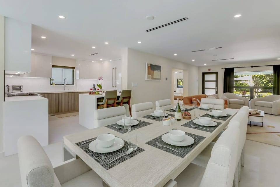 Dining Table | Open concept, flows into living areas + kitchen.