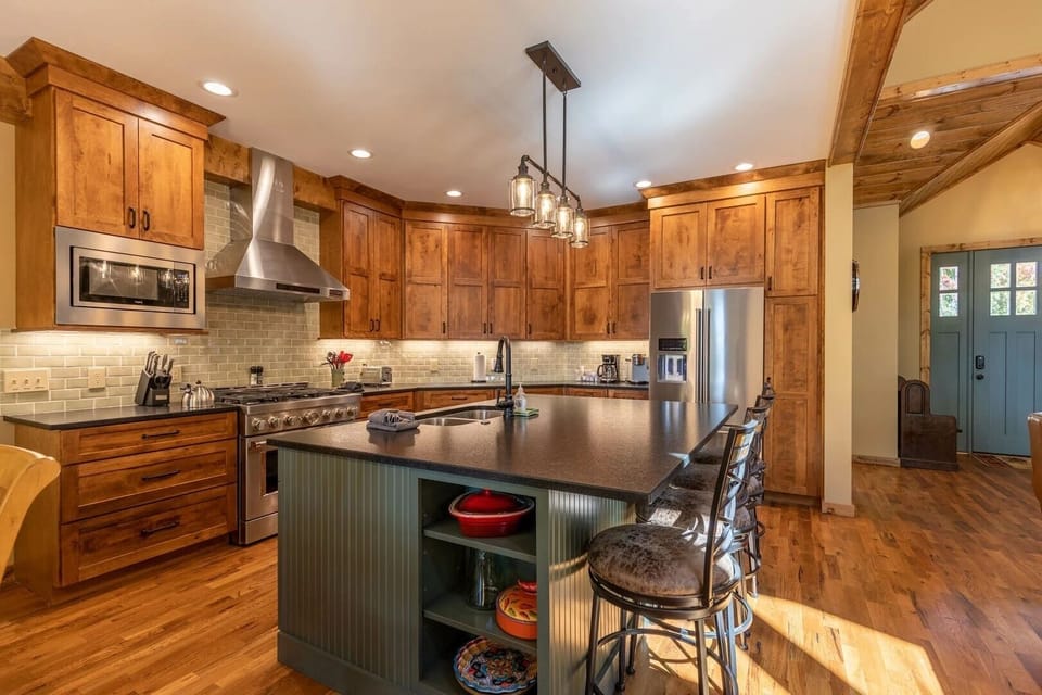 Gourmet Kitchen with Stainless Appliances and Spacious Center Island