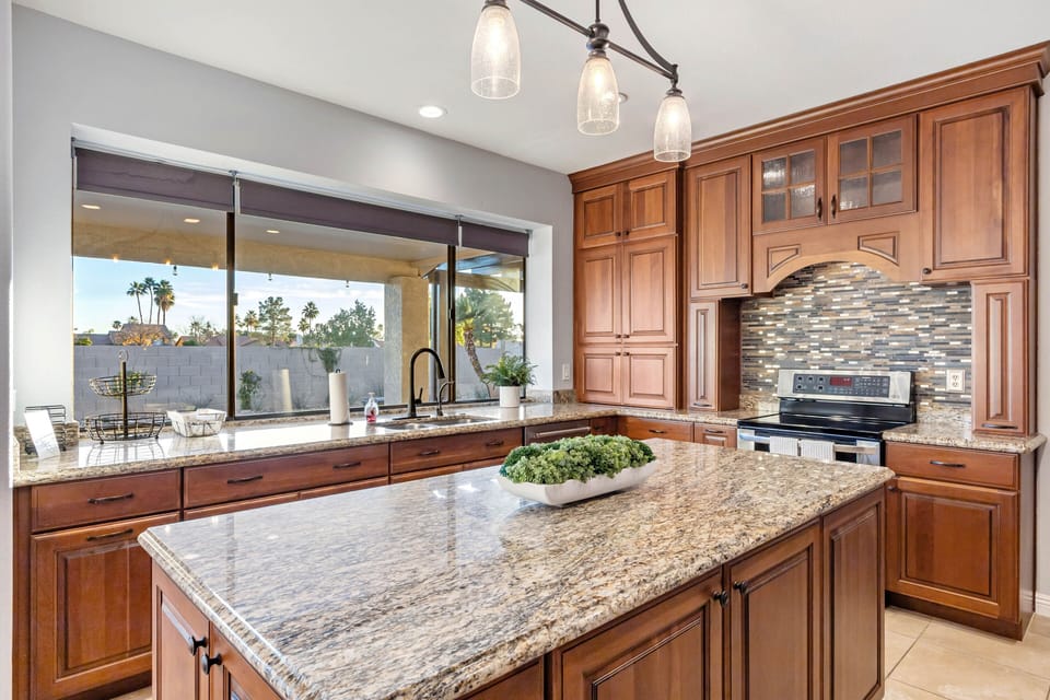 Fully Equipped Kitchen - Stainless Steel Appliances and Stone Counters