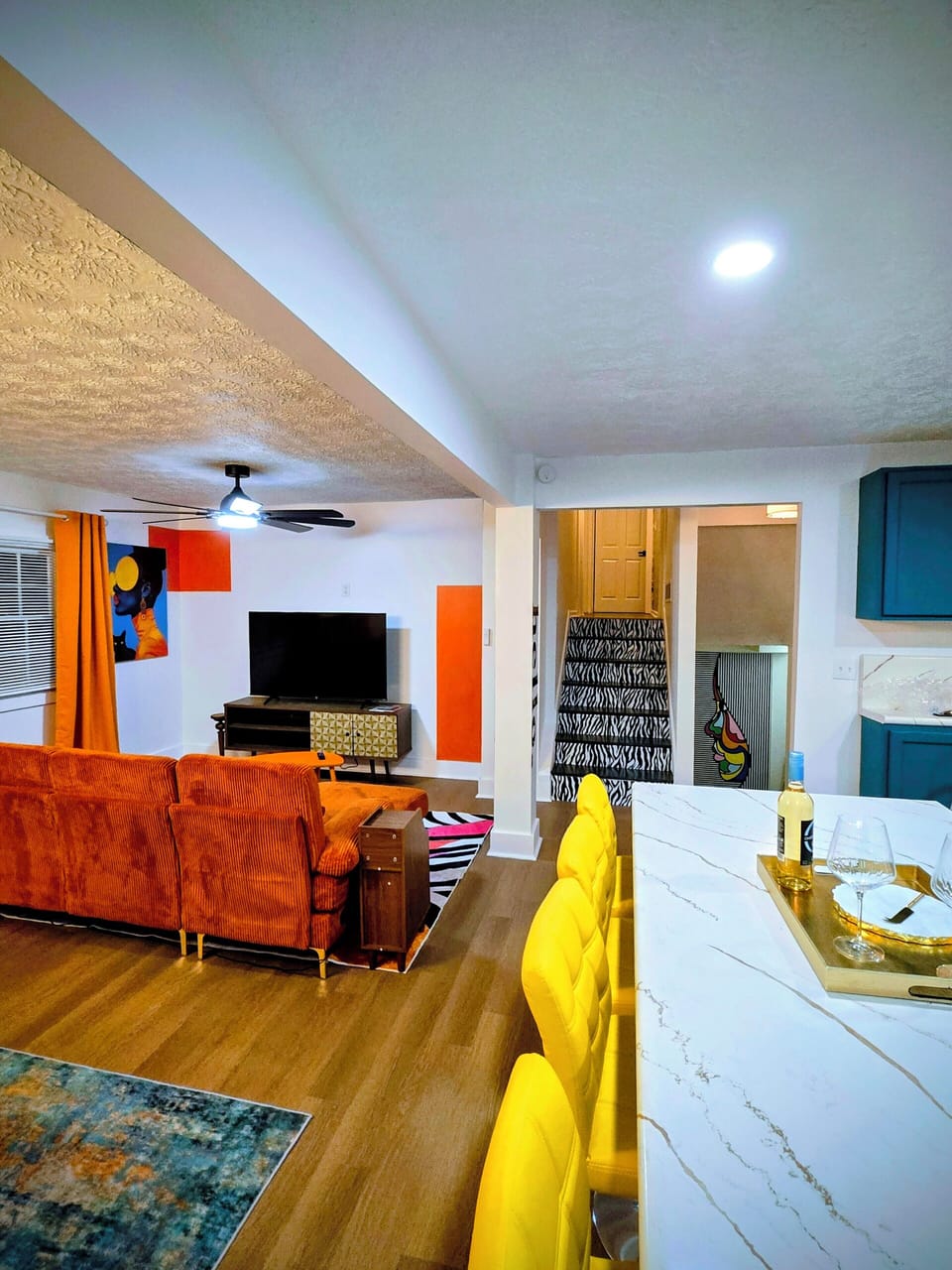 interior, indoor, climate control, couch, living area, television, dining table