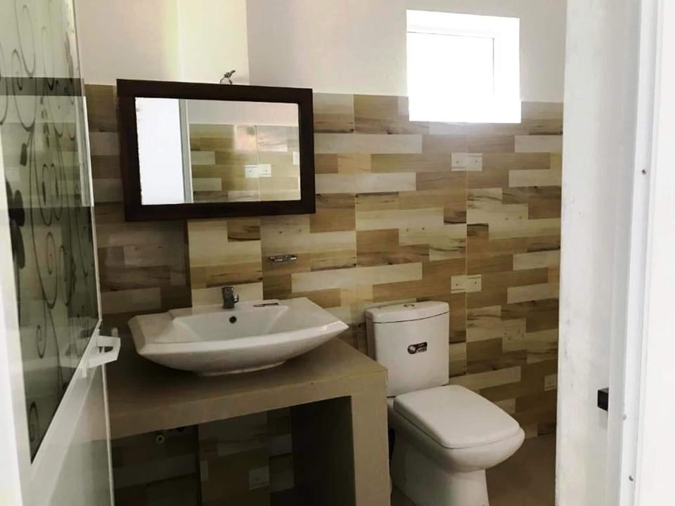 Family Triple Room, Garden View | Bathroom | Shower, free toiletries, hair dryer, bathrobes